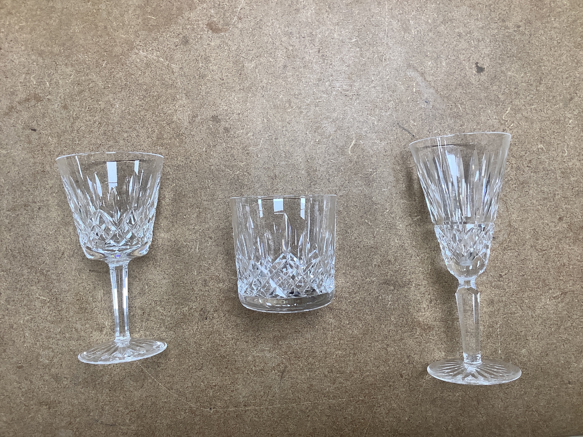 A 68 piece part suite of Waterford cut crystal ‘’Lismore’’ pattern drinking glassware, consisting:- 12 champagne glasses, 9 red wine glasses, 6 white wine glasses, 12 liqueur glasses, 12 whisky tumblers, 12 sherry glasse